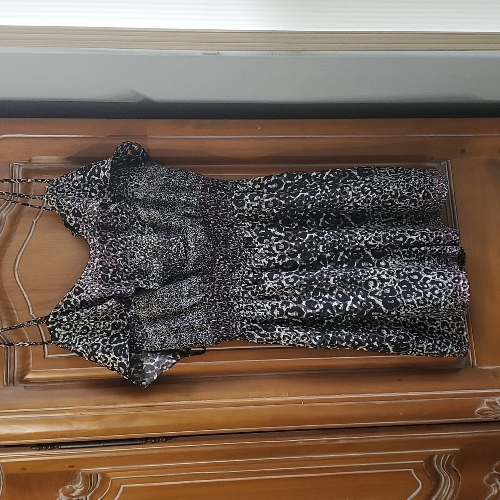 BCBG Generation romper, animal print. Size small. Polyester. Washable.
